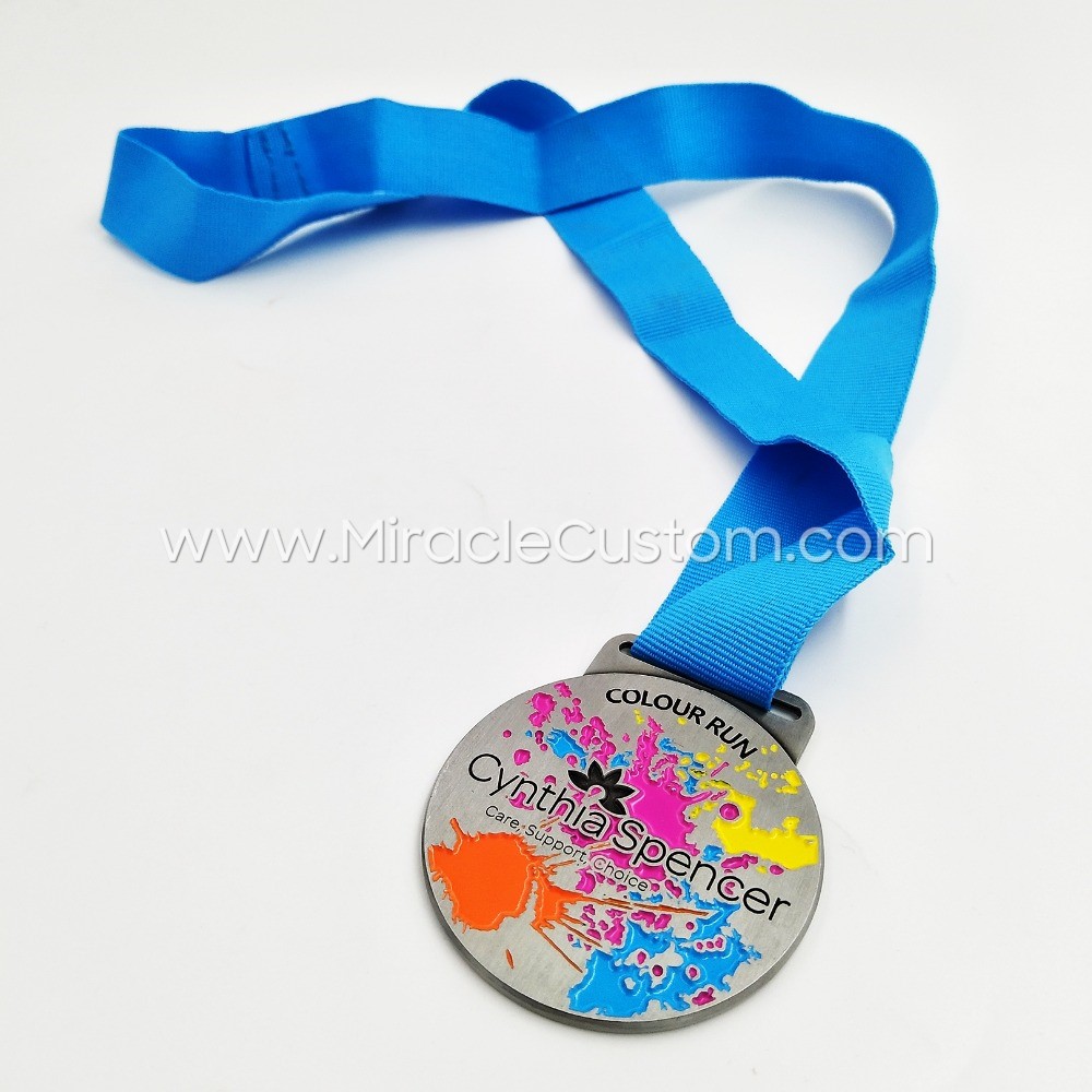 Color run medals for Cynthia Spencer hospice events