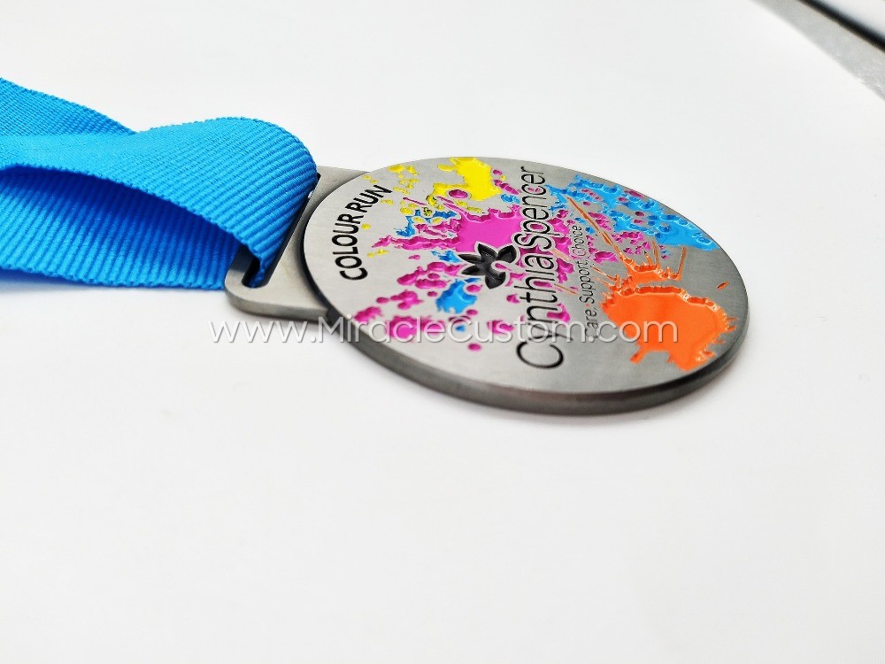 Color run medals for Cynthia Spencer hospice events