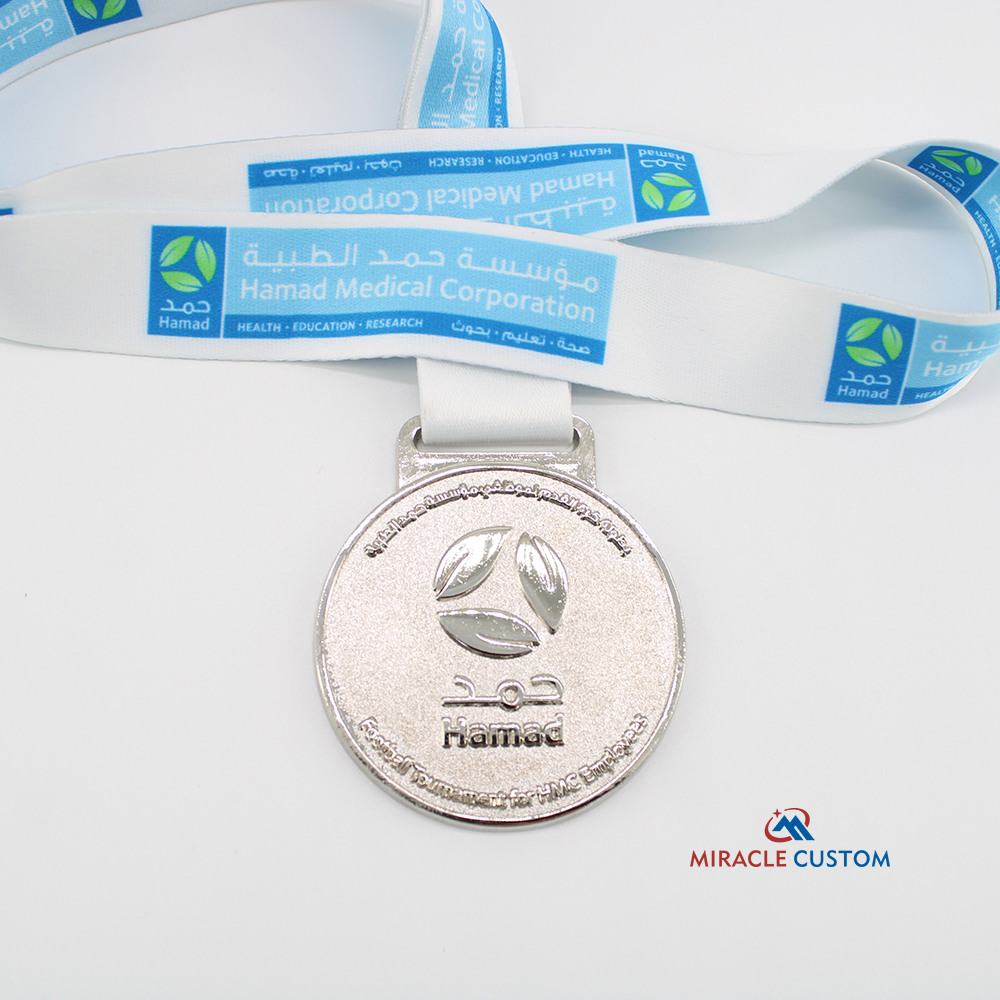 Custom football medals for football tournament for hmc employees